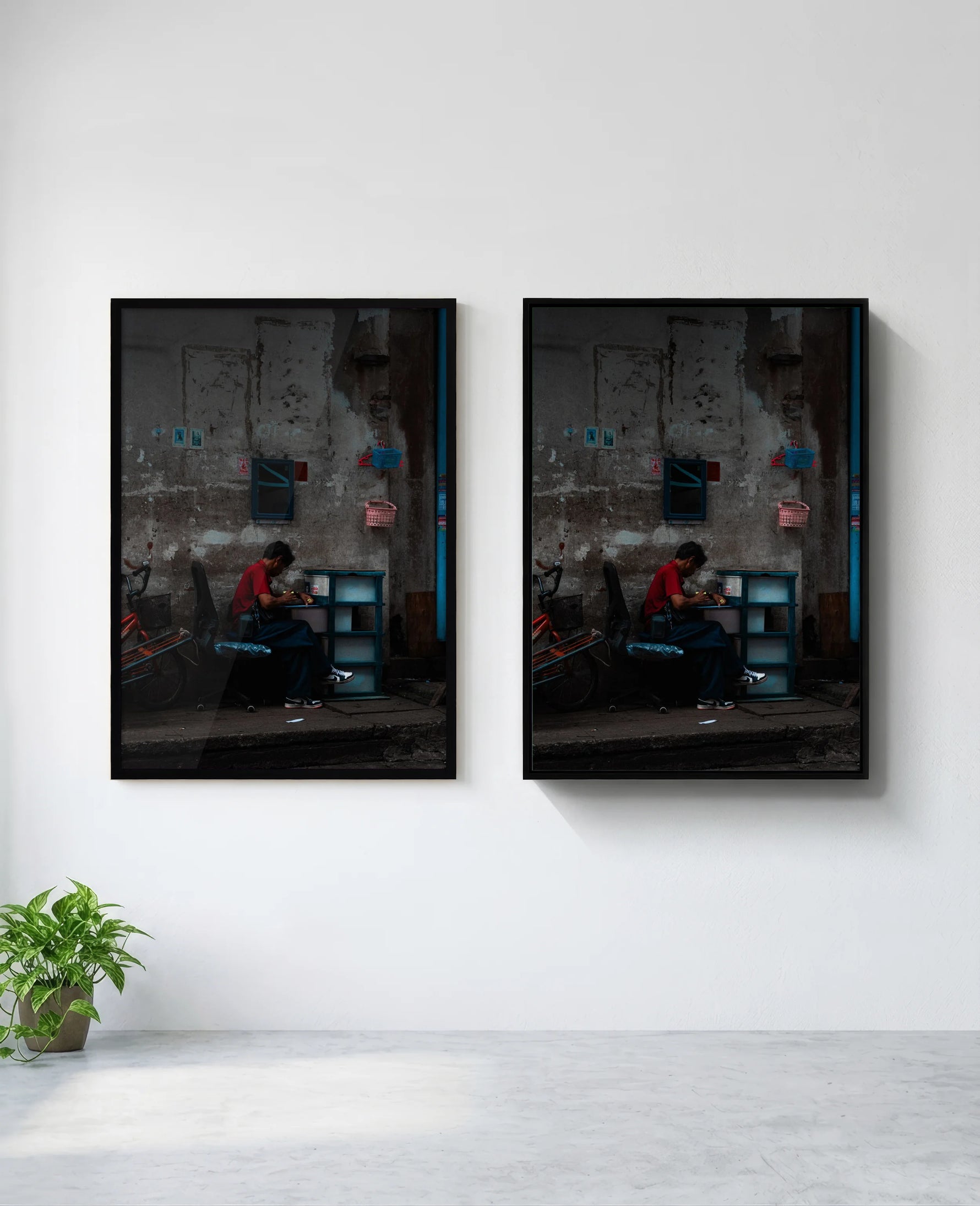 Assembly art print in black frame, installed on wall