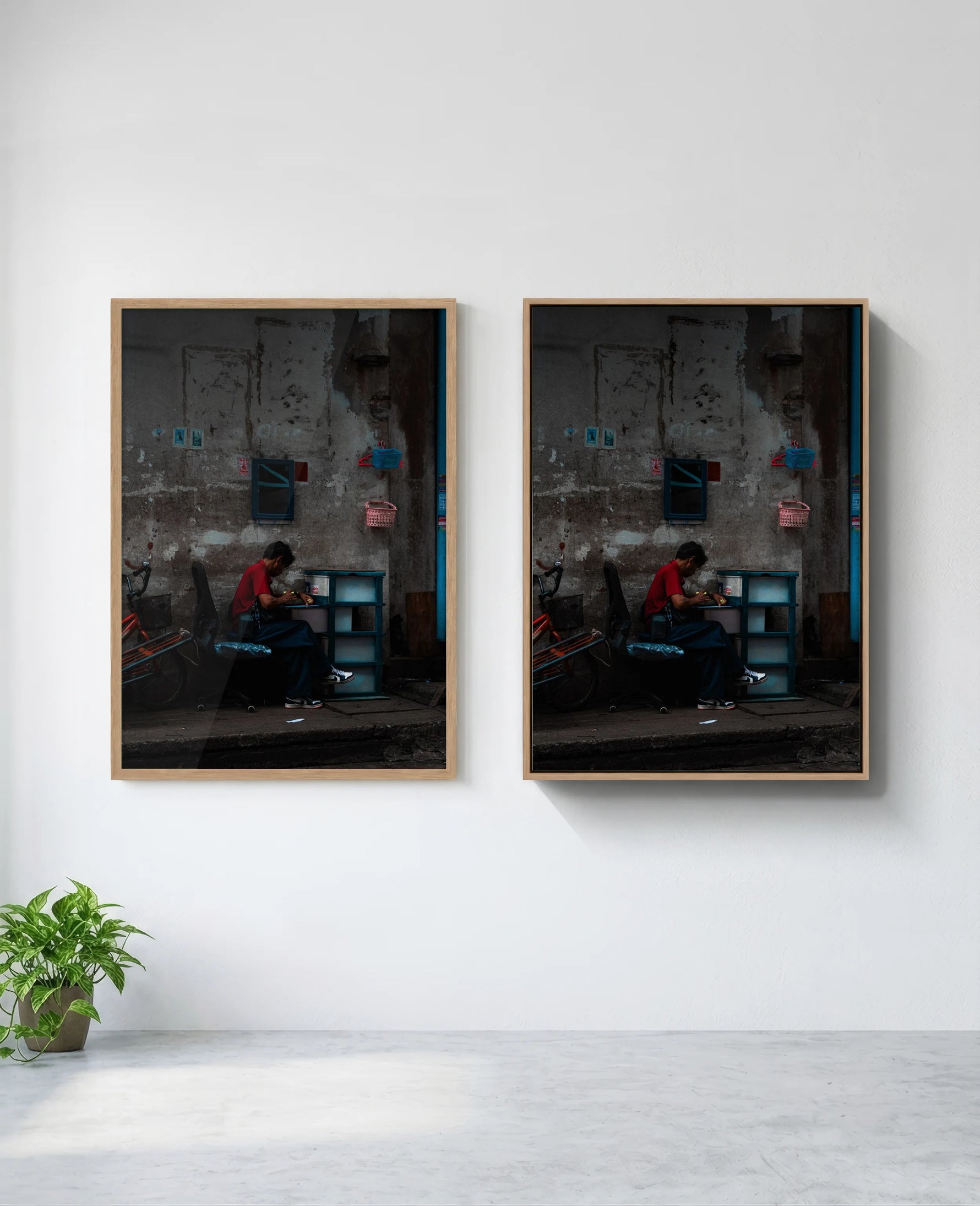 Assembly art print in natural-wood frame, installed on wall