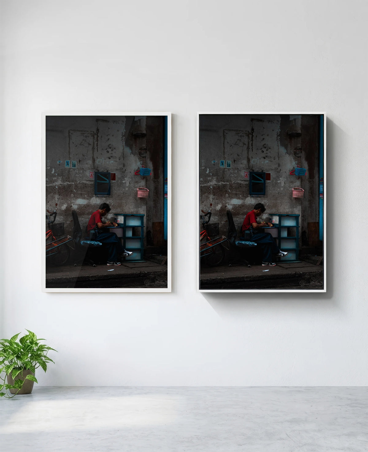 Assembly art print in white frame, installed on wall