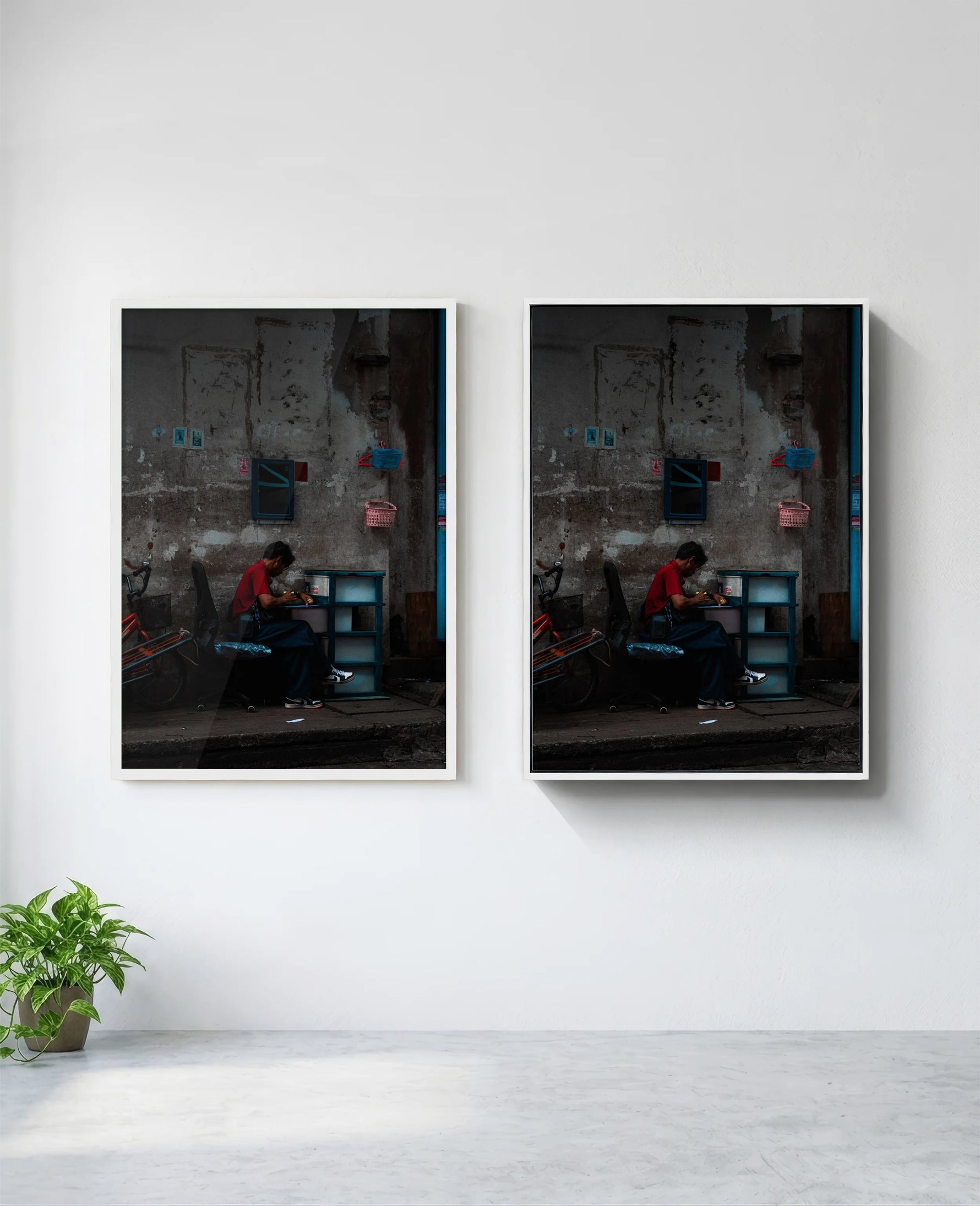 Assembly art print in white frame, installed on wall