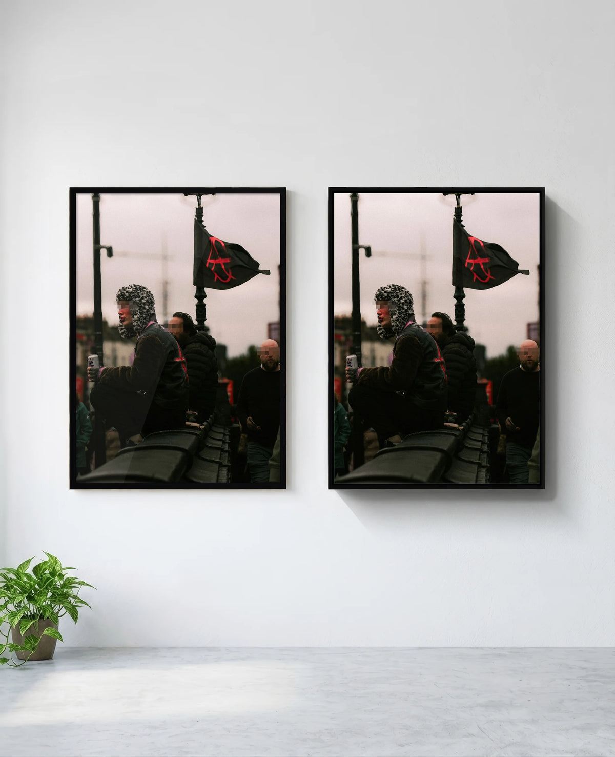 Anarchy art print in black frame, installed on wall
