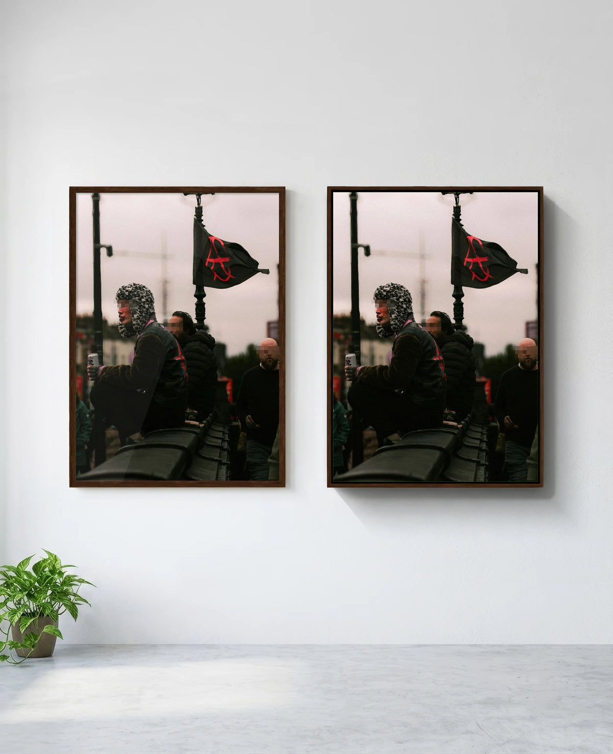 Anarchy art print in brown frame, installed on wall