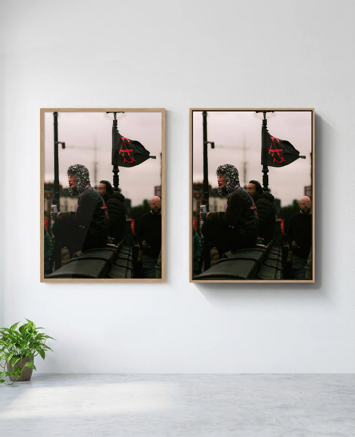 Anarchy art print in natural-wood frame, installed on wall