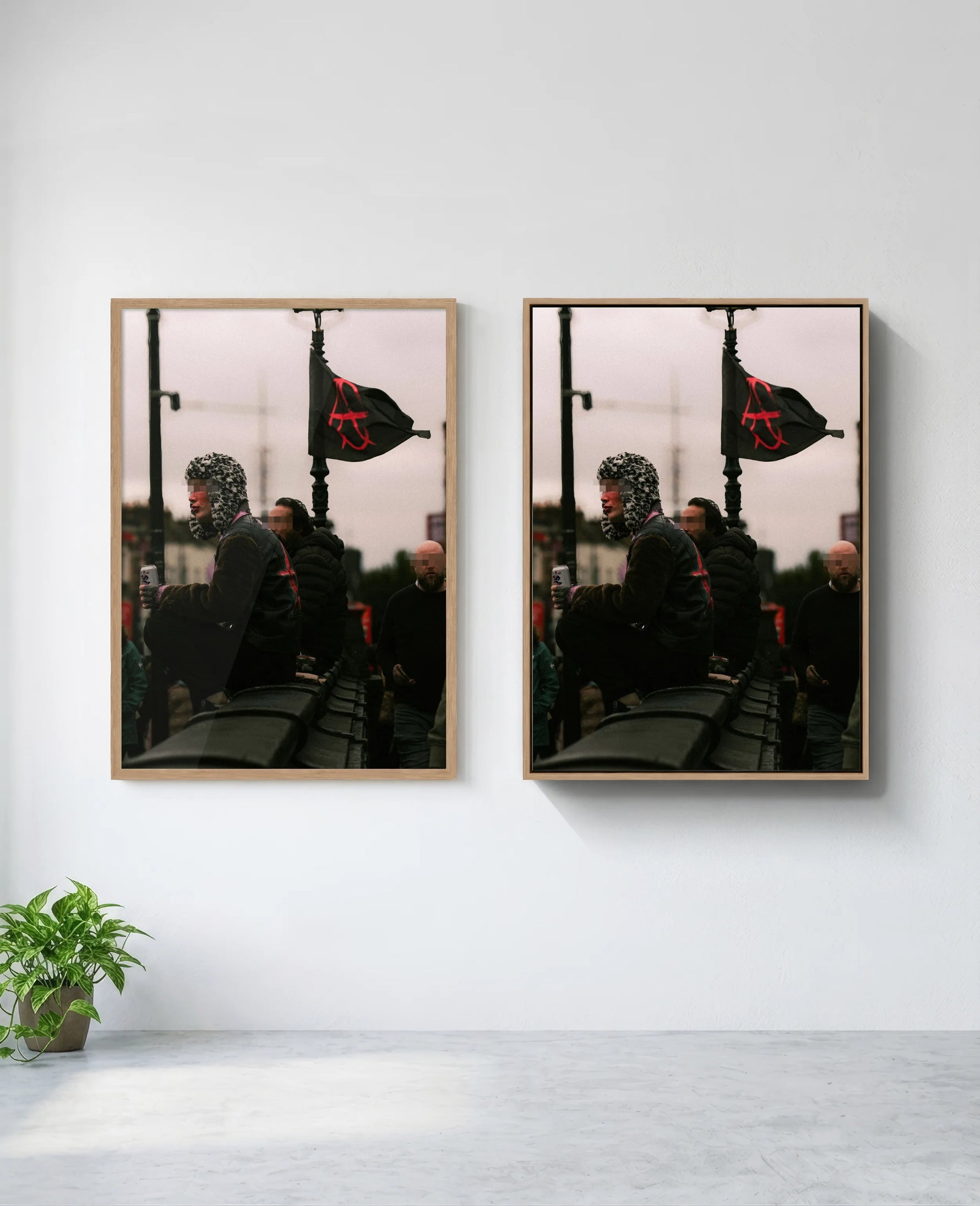 Anarchy art print in natural-wood frame, installed on wall