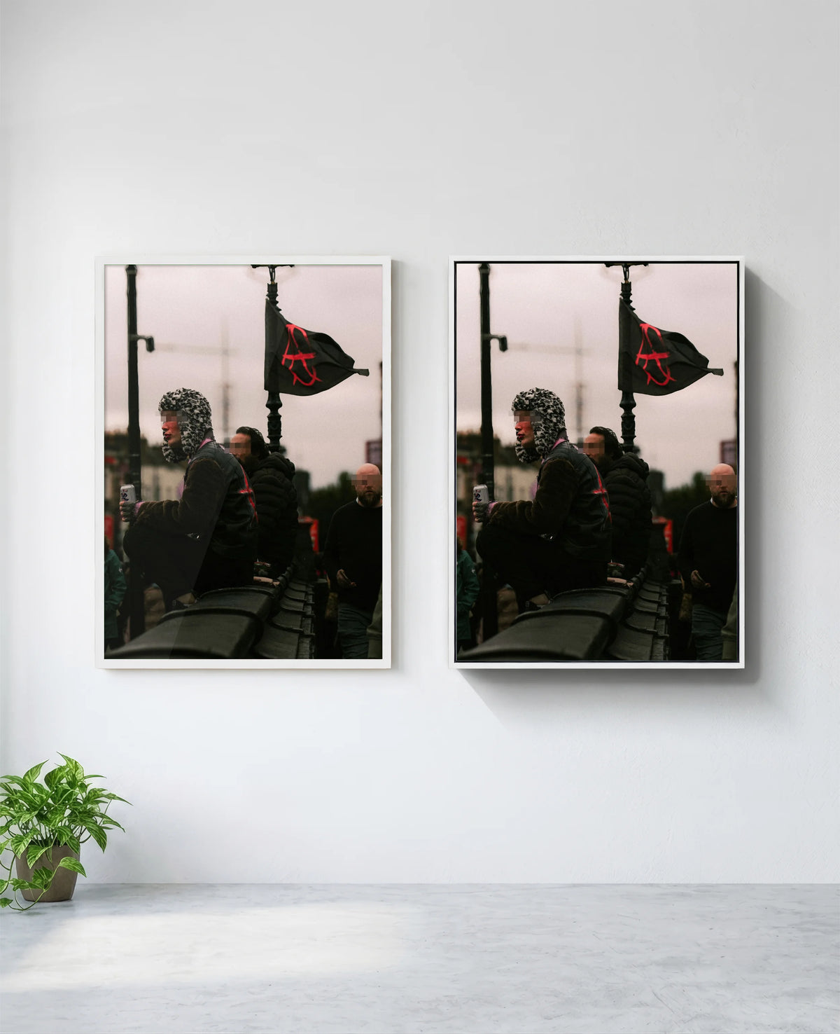 Anarchy art print in white frame, installed on wall