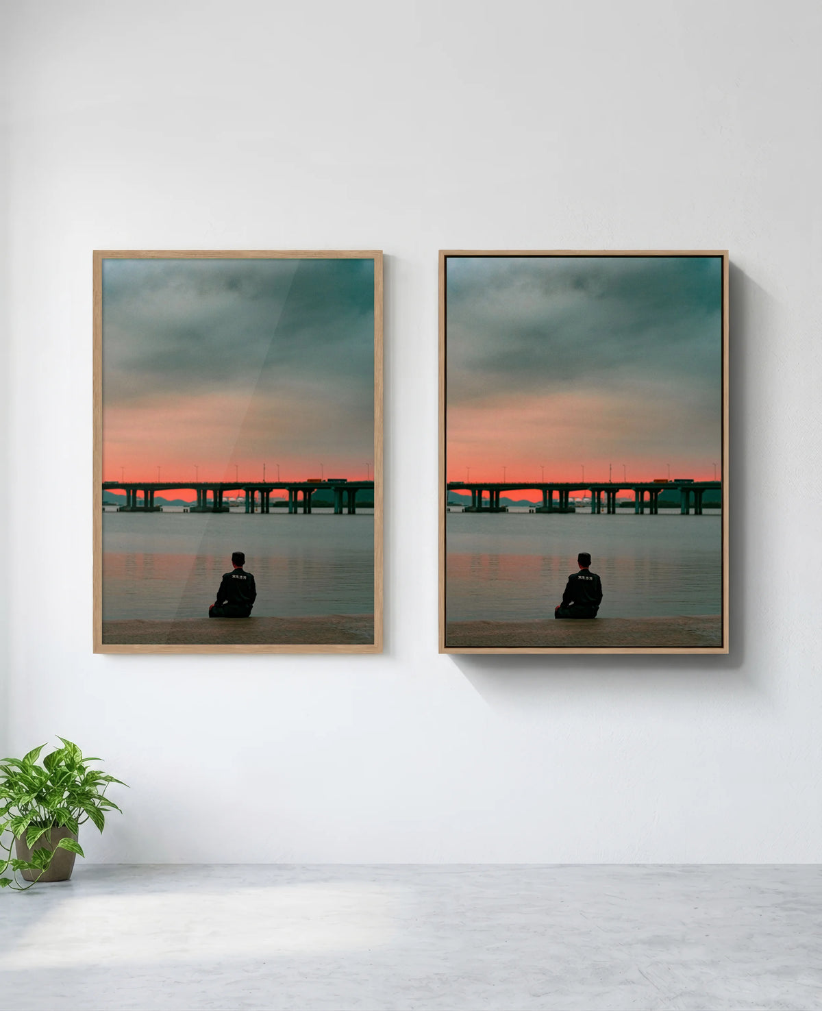 Still art print in natural-wood frame, installed on wall