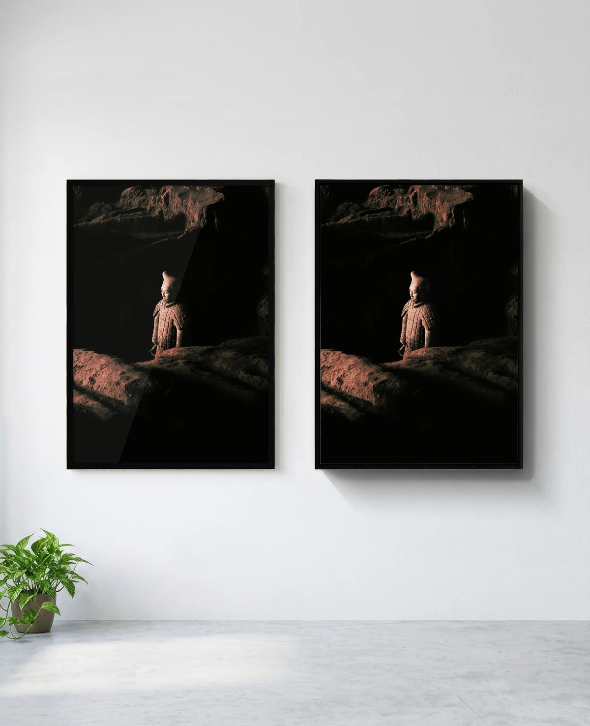 Warrior art print in black frame, installed on wall