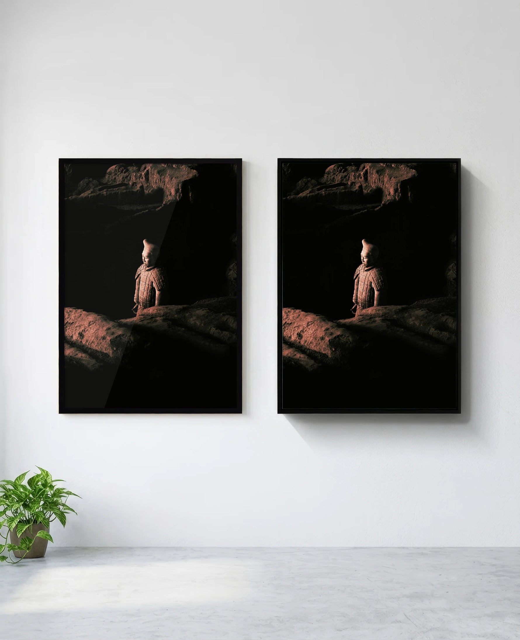 Warrior art print in black frame, installed on wall