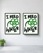 I Need Water art print in black frame, installed on wall