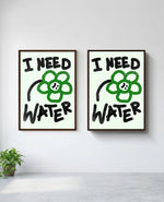 I Need Water art print in brown frame, installed on wall