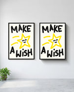 Make a Wish art print in black frame, installed on wall