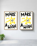 Make a Wish art print in natural-wood frame, installed on wall