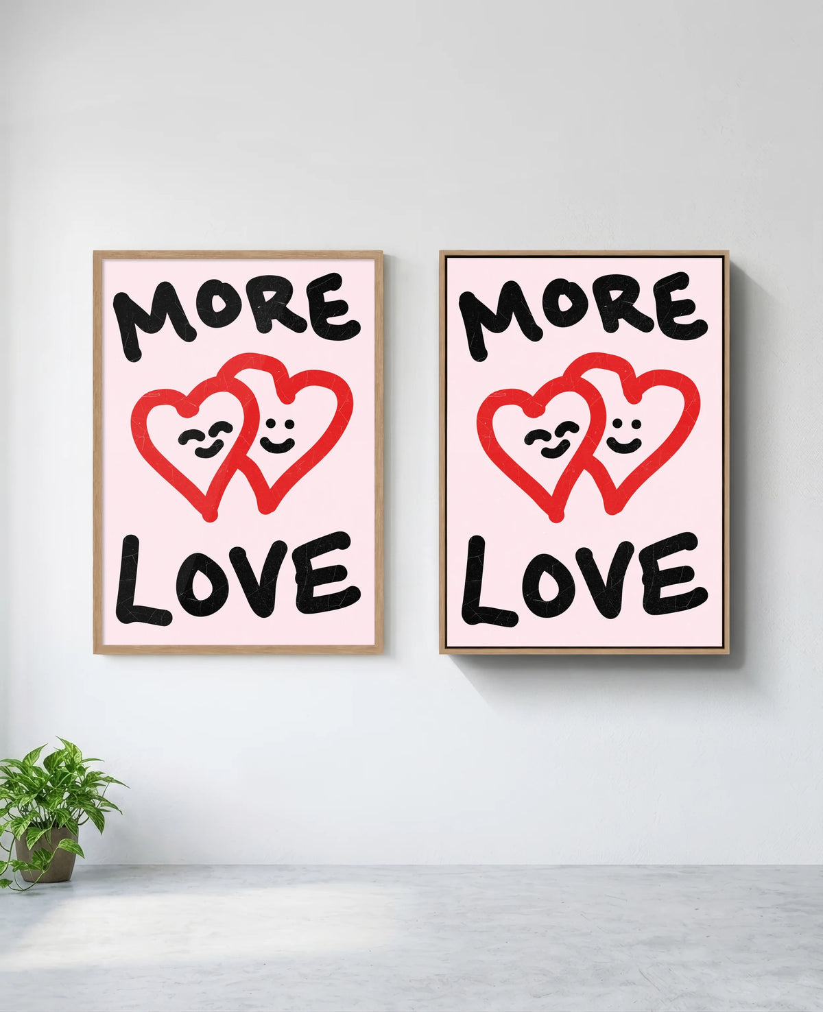 More Love art print in natural-wood frame, installed on wall