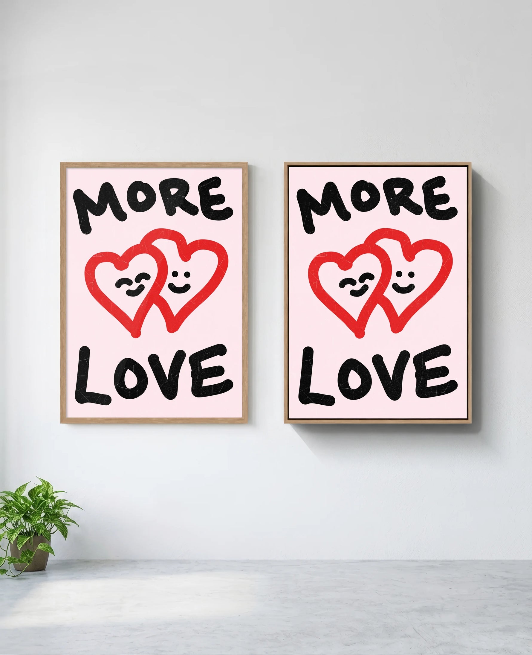 More Love art print in natural-wood frame, installed on wall