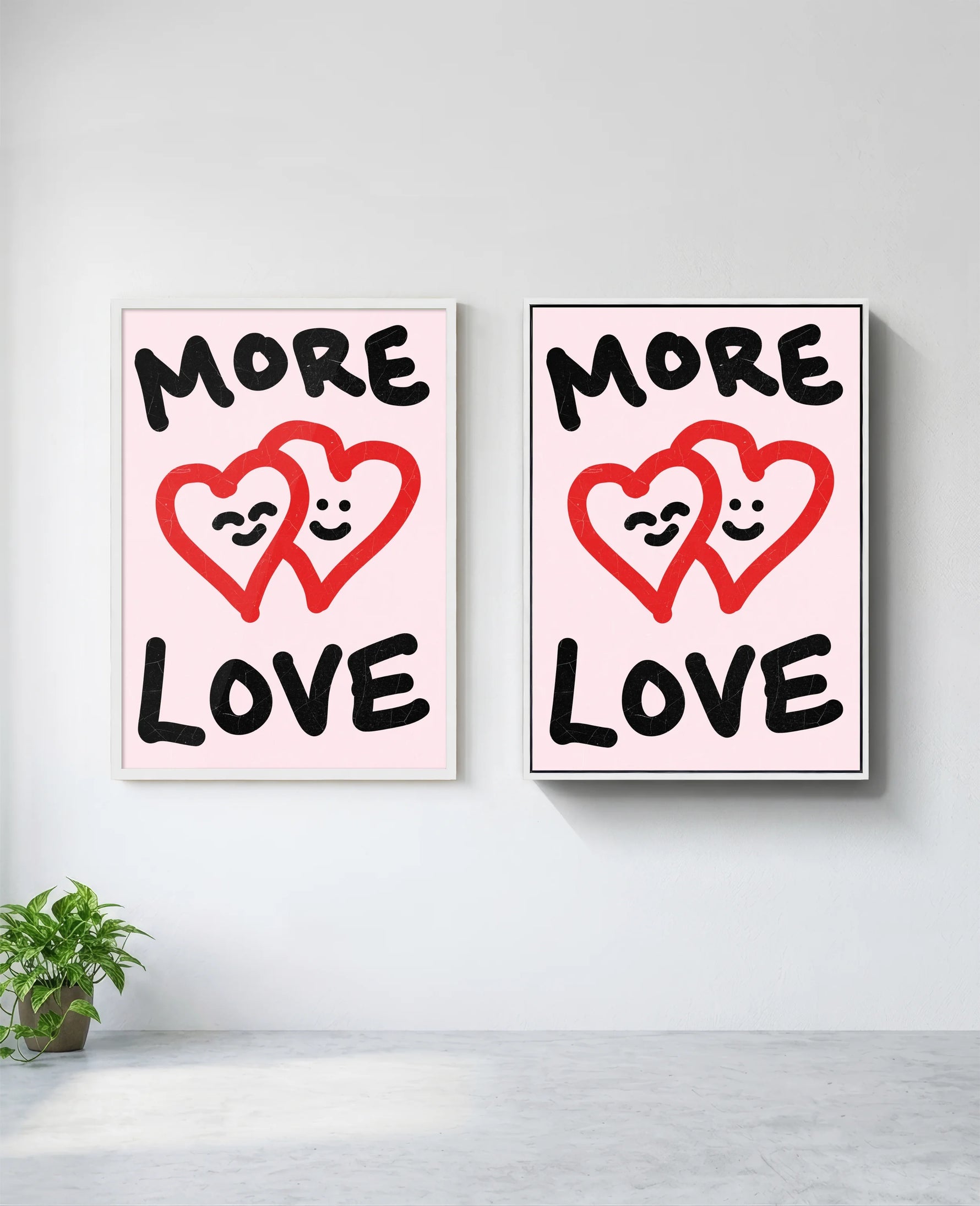 More Love art print in white frame, installed on wall