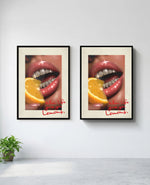 Lemons art print in black frame, installed on wall