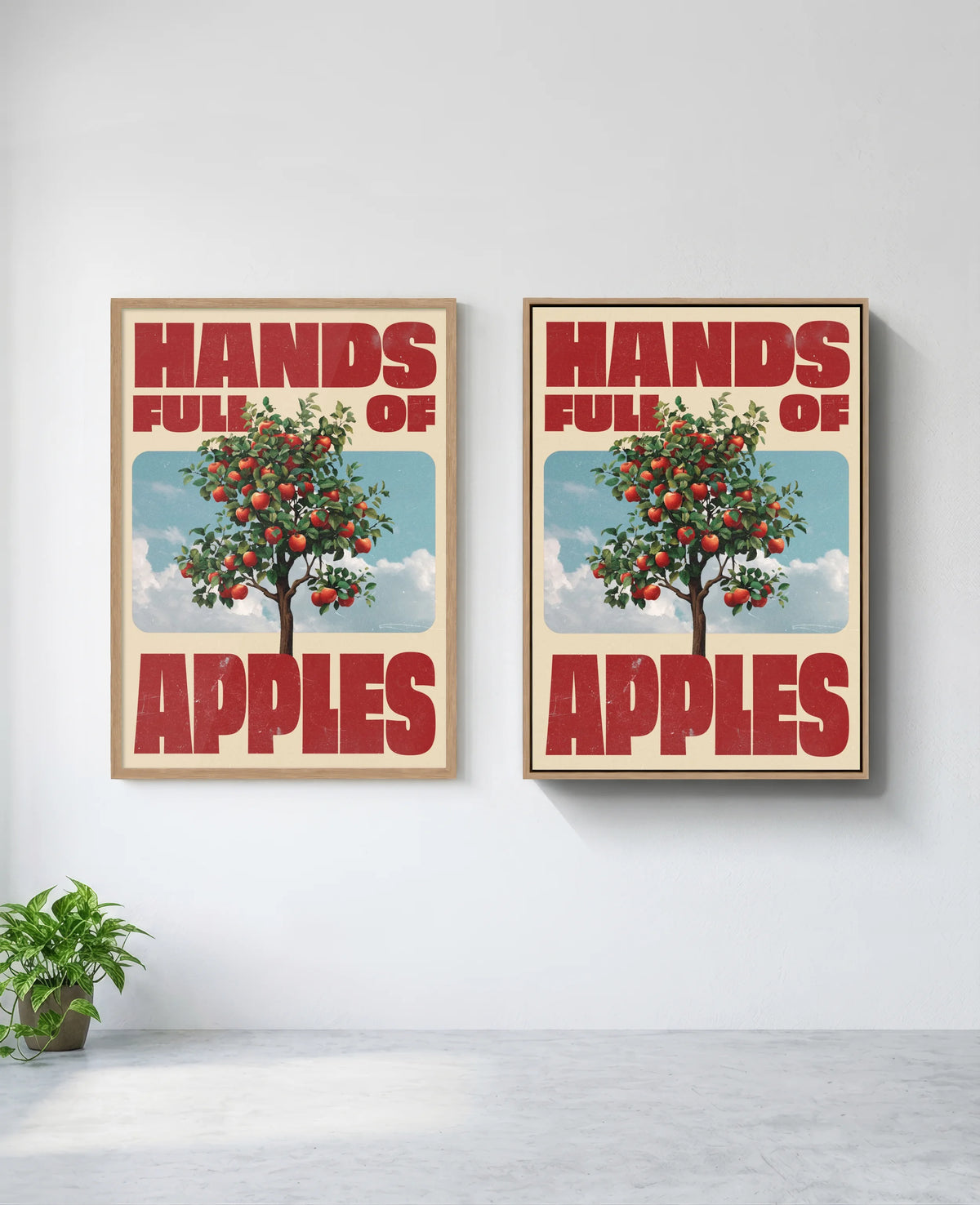 Hands Full of Apples art print in natural-wood frame, installed on wall