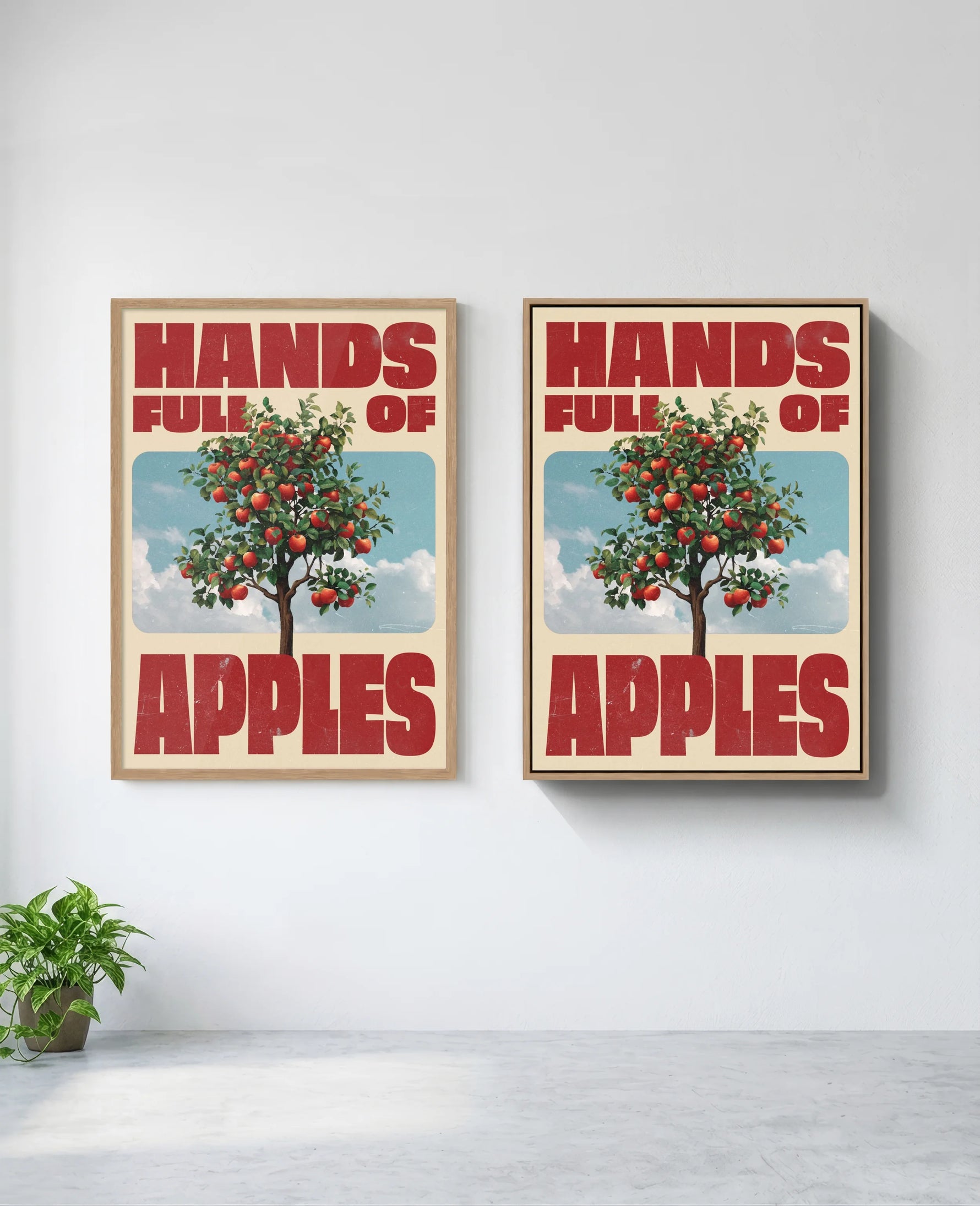 Hands Full of Apples art print in natural-wood frame, installed on wall