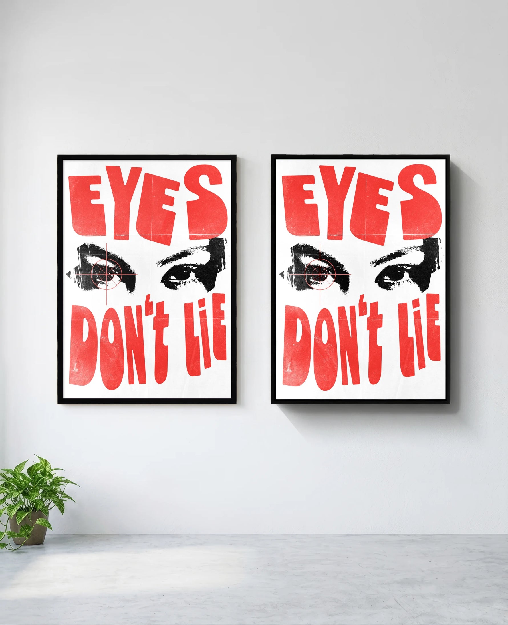 Eyes Don't Lie art print in black frame, installed on wall