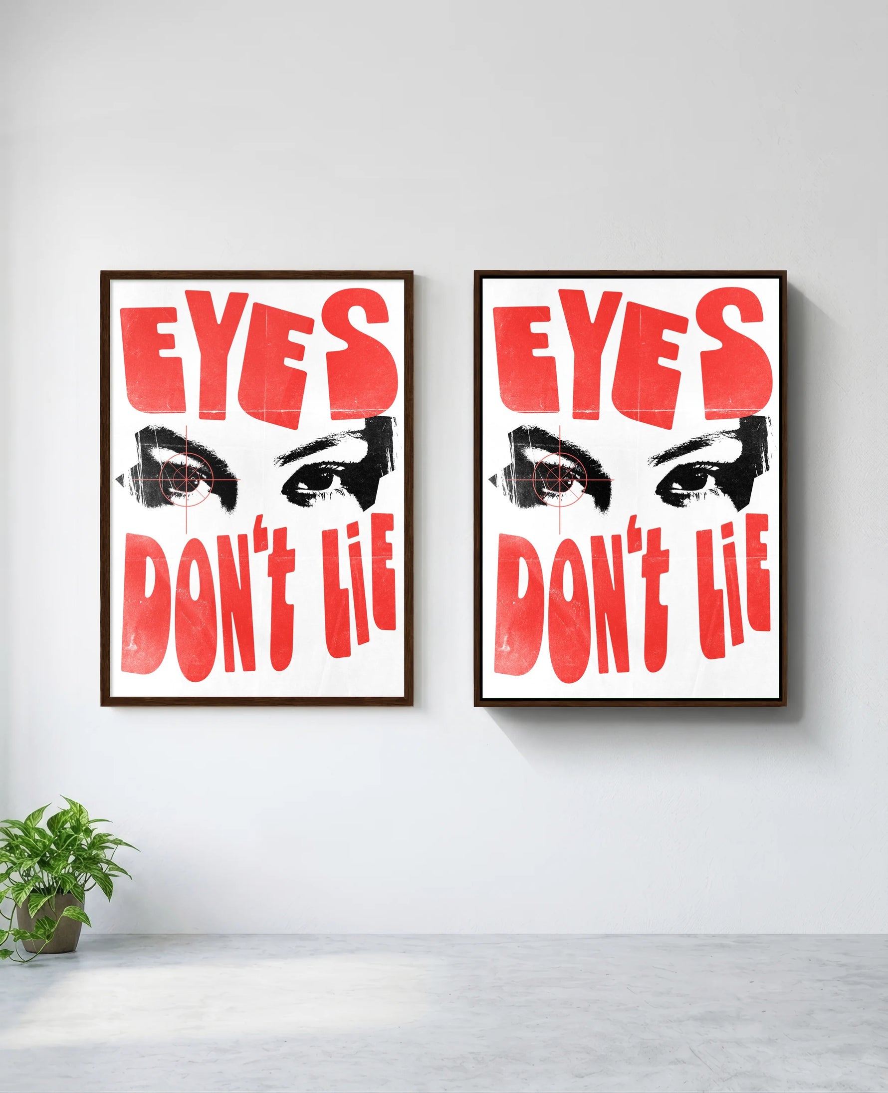 Eyes Don't Lie art print in brown frame, installed on wall