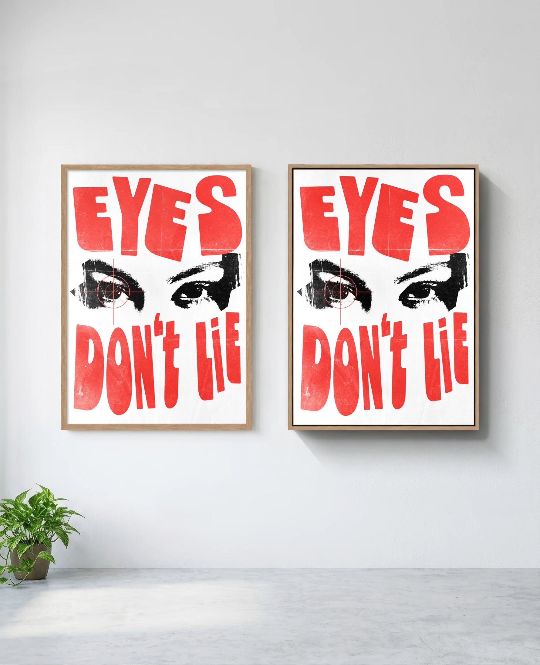 Eyes Don't Lie art print in natural-wood frame, installed on wall