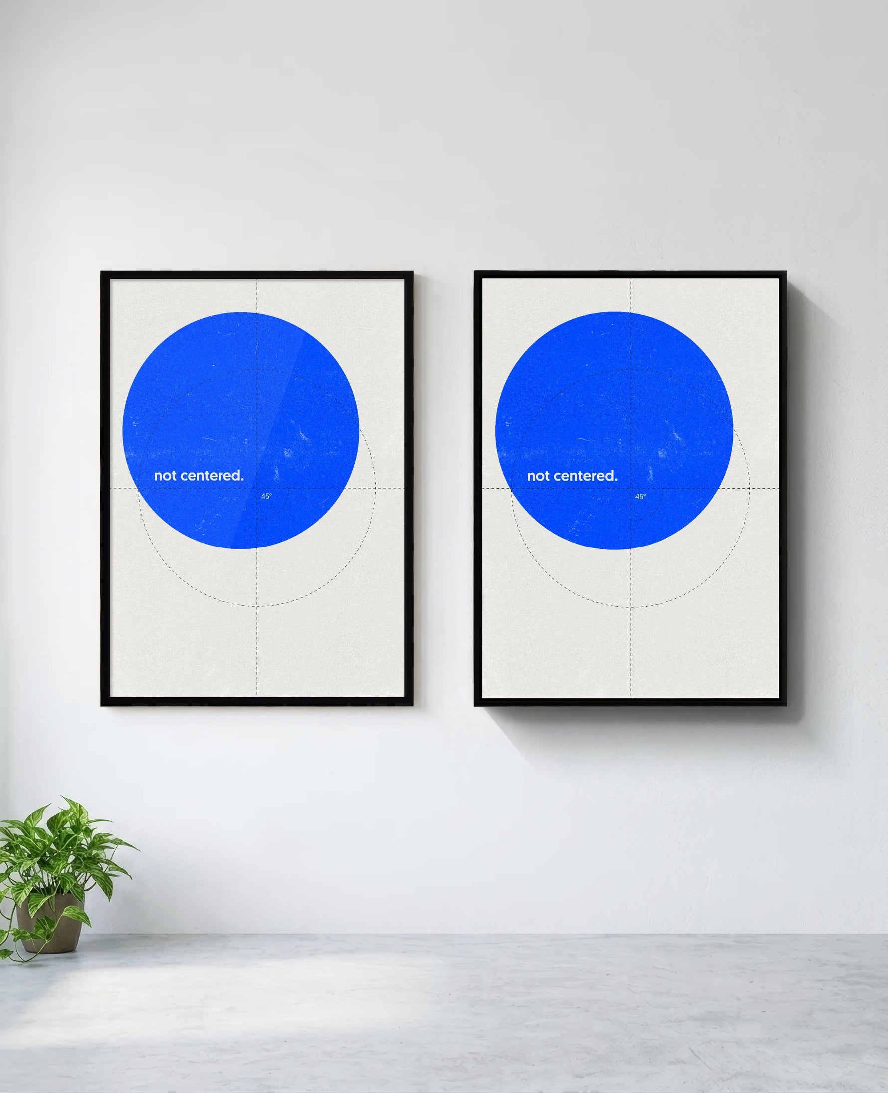 Not Centered art print in black frame, installed on wall