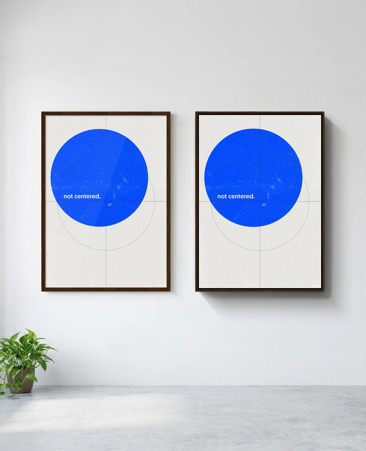 Not Centered art print in brown frame, installed on wall