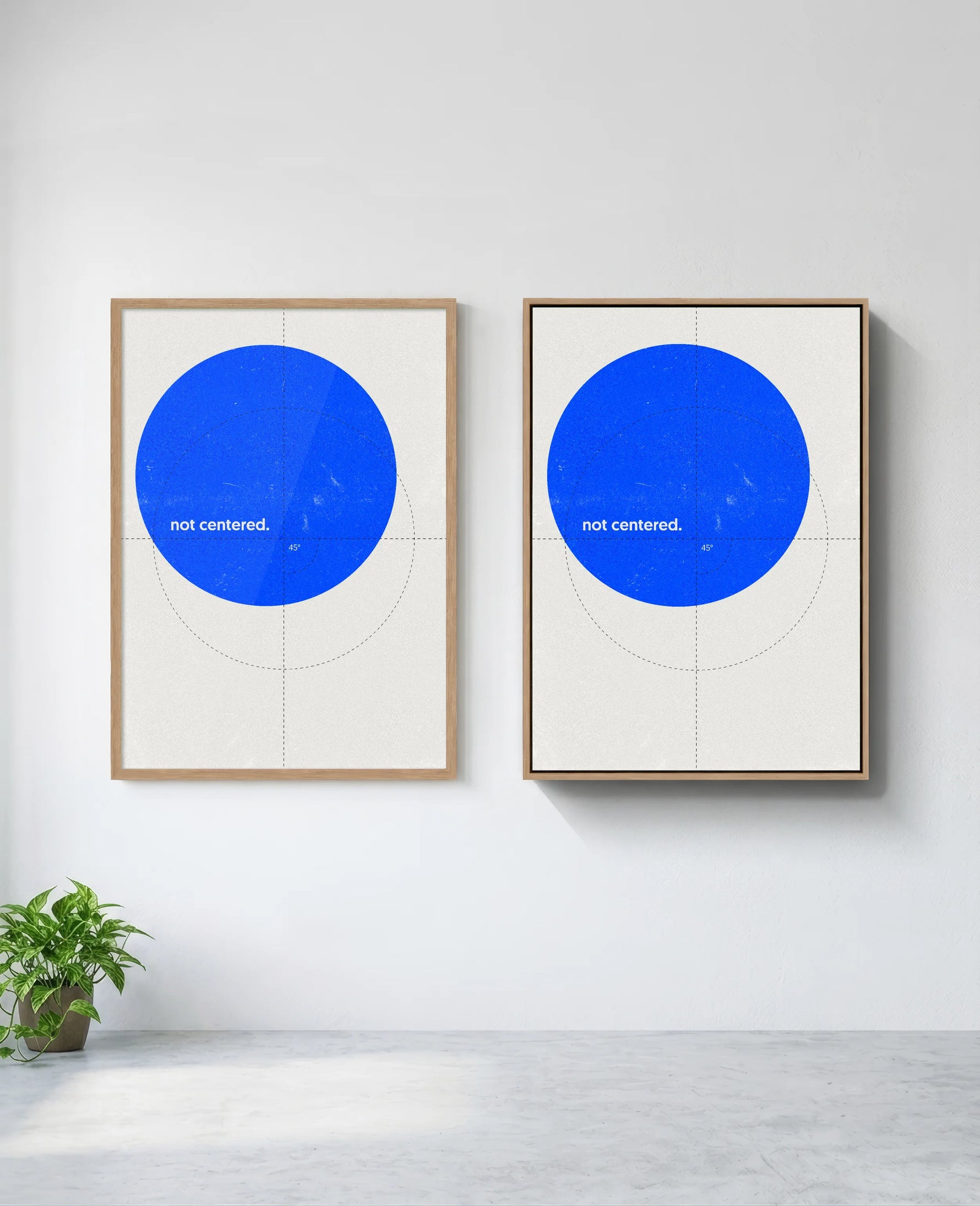 Not Centered art print in natural-wood frame, installed on wall