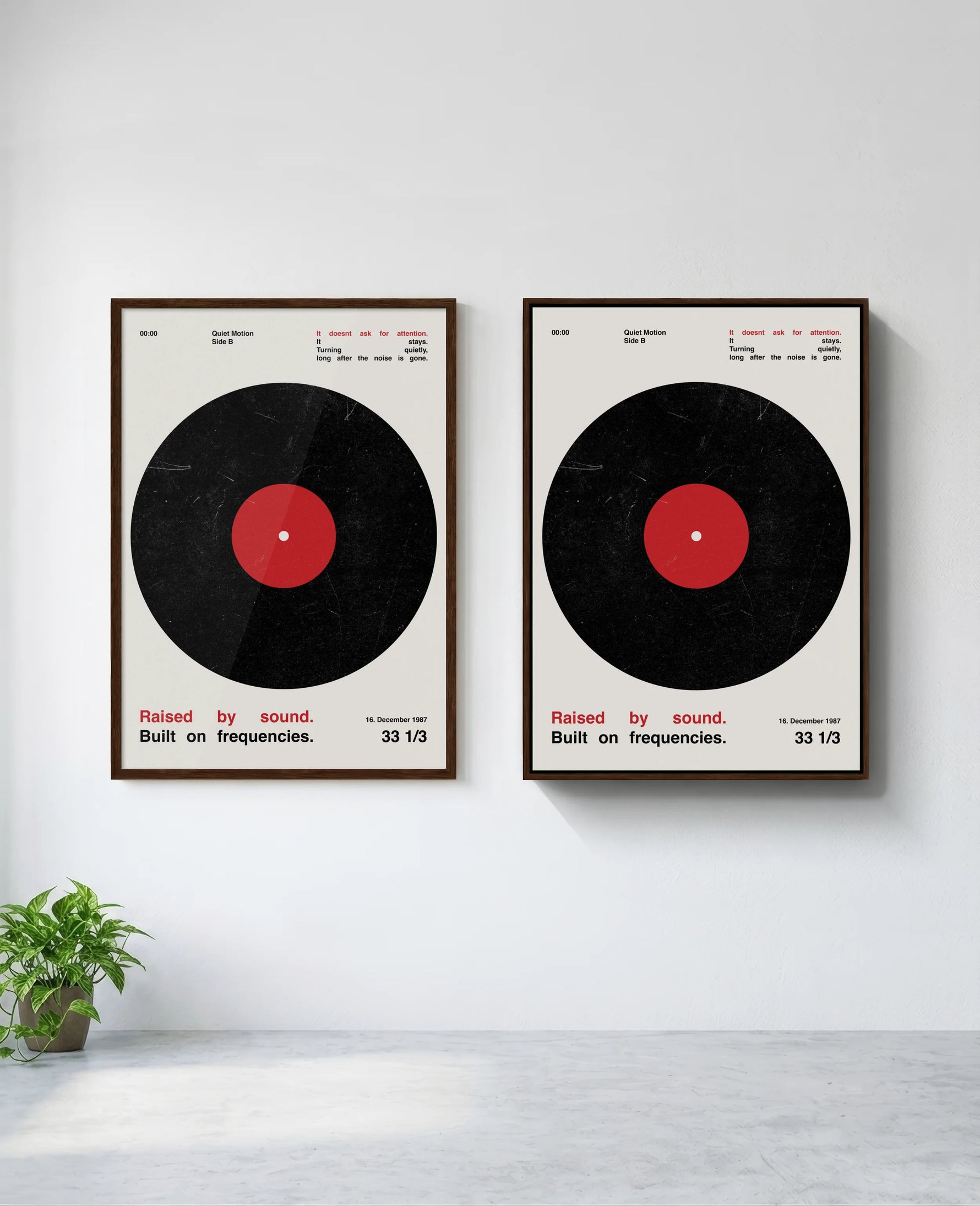 Vinyl art print in brown frame, installed on wall