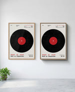 Vinyl art print in natural-wood frame, installed on wall