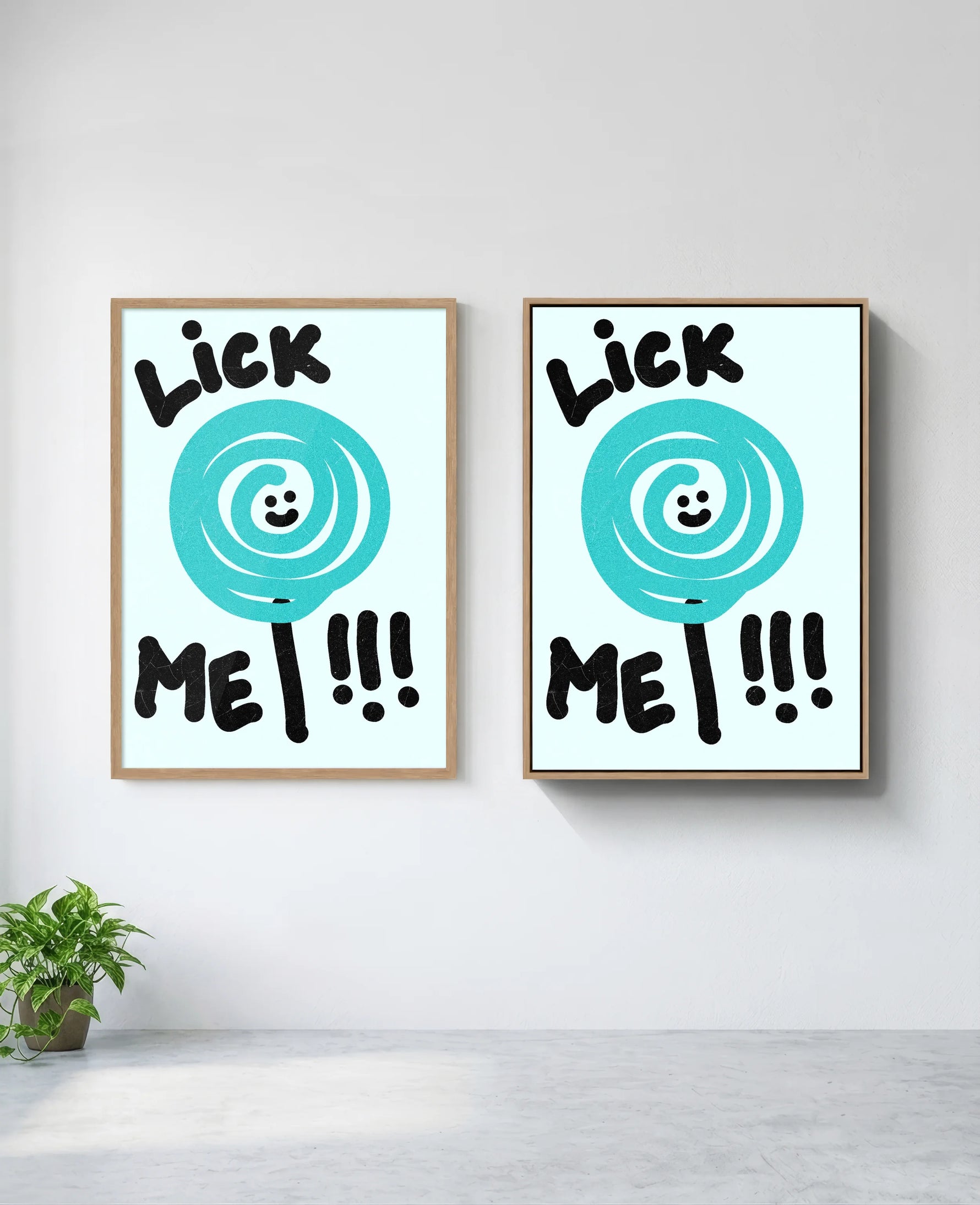 Lick Me art print in natural-wood frame, installed on wall