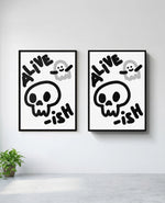 Alive-ish art print in black frame, installed on wall
