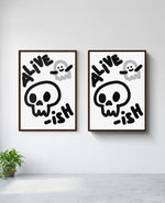 Alive-ish art print in brown frame, installed on wall