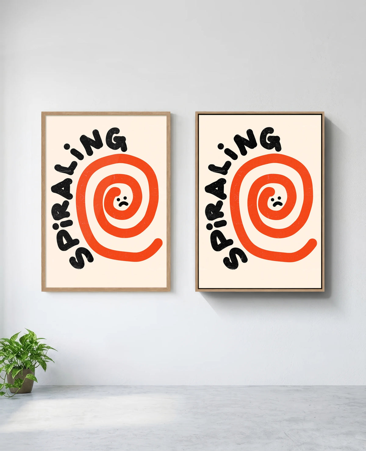 Spiraling art print in natural-wood frame, installed on wall