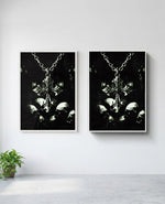 Memento Mori art print in white frame, installed on wall